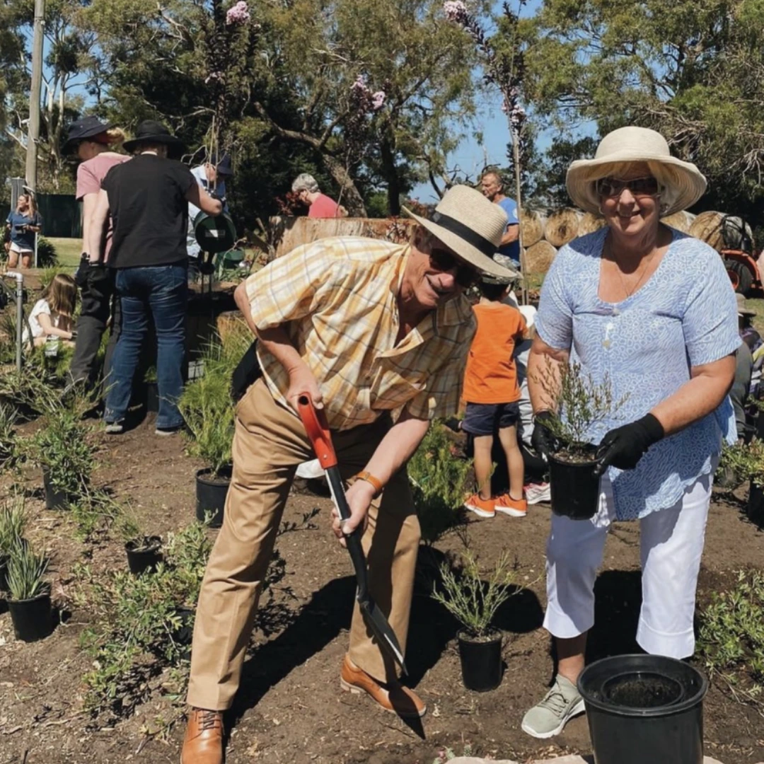 Volunteers planting trees during Mornington Living Legacy Garden Planting Day event