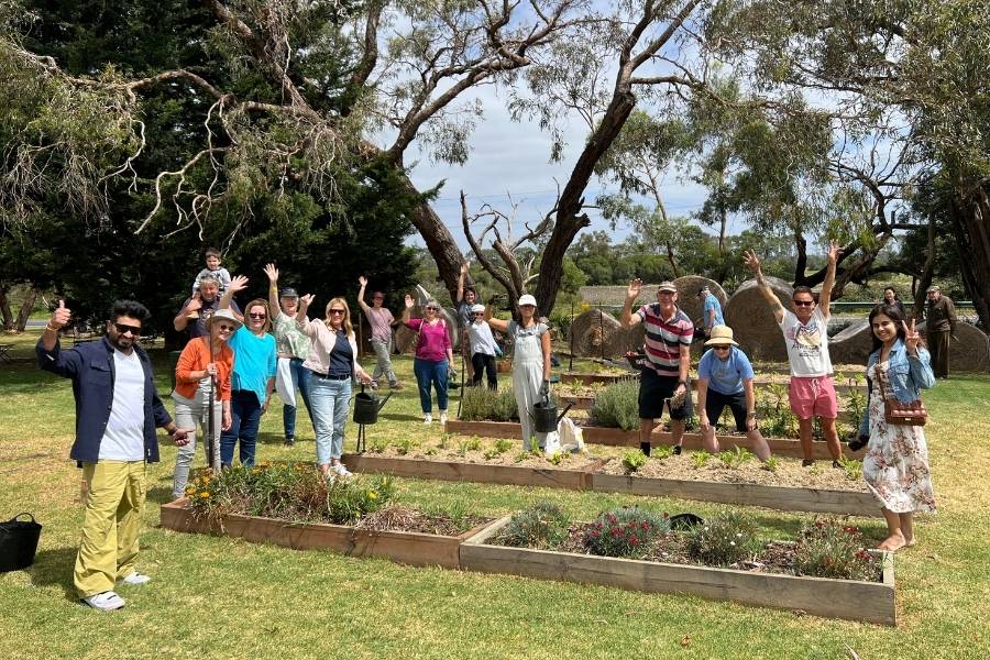 A flower planting event in Mornington Green Living Legacy Gardens