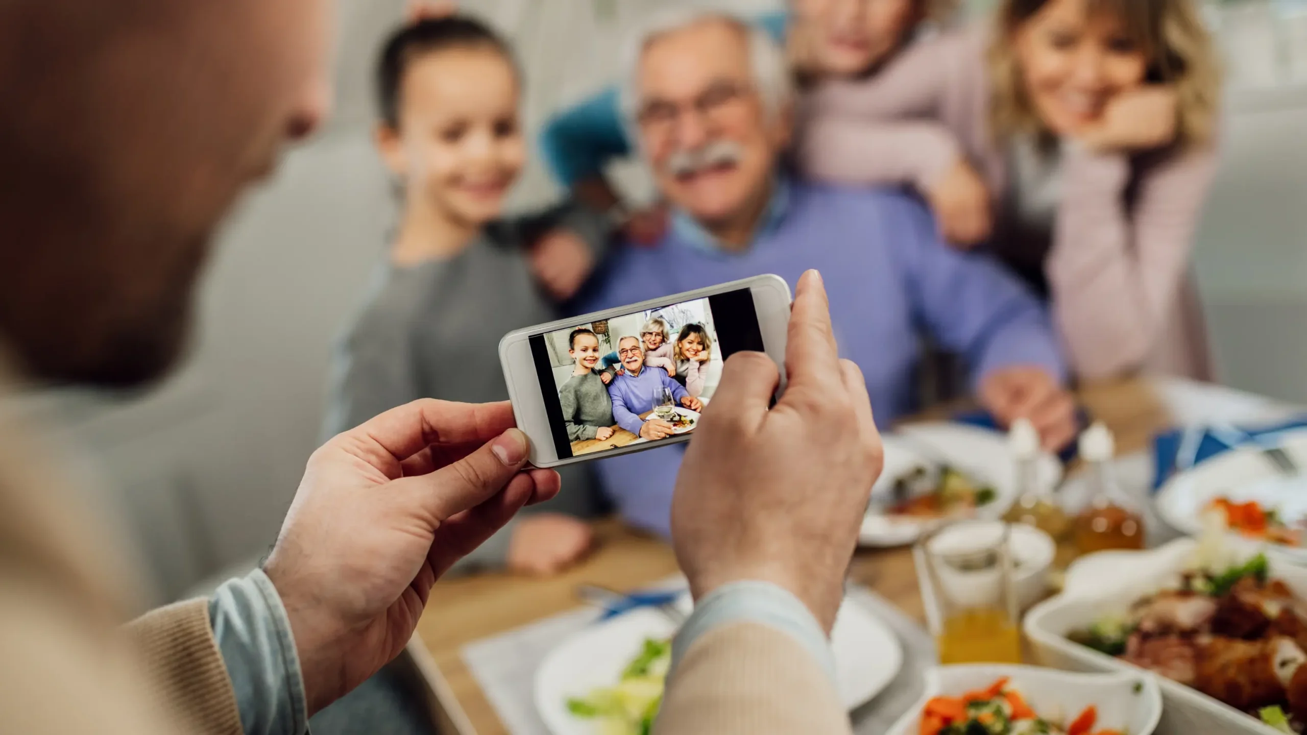 Family celebrating a parent’s birthday as a memorial tradition in Australia.