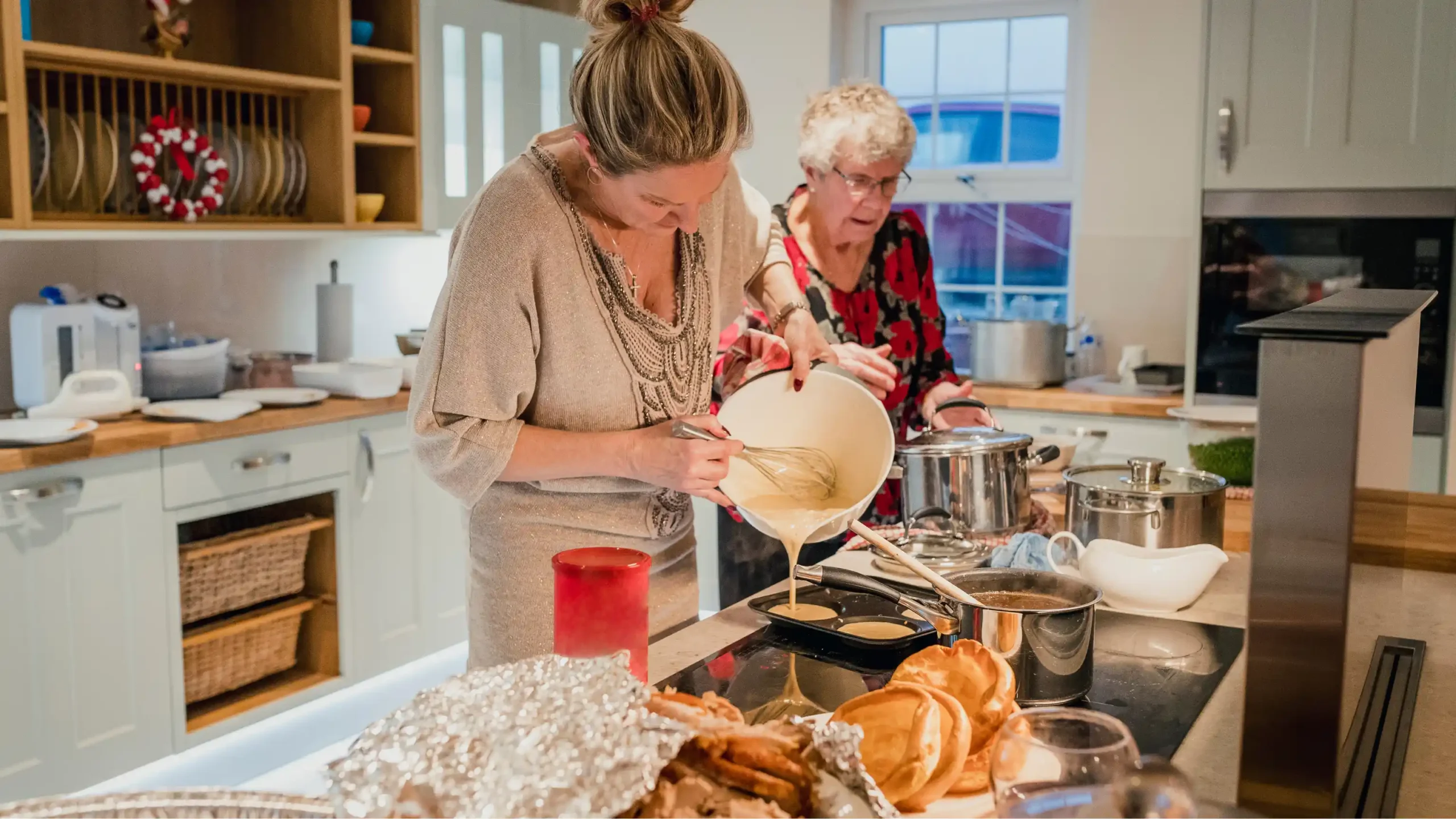 Mother and daughter cooking together as a way of remembering a parent in Australia.