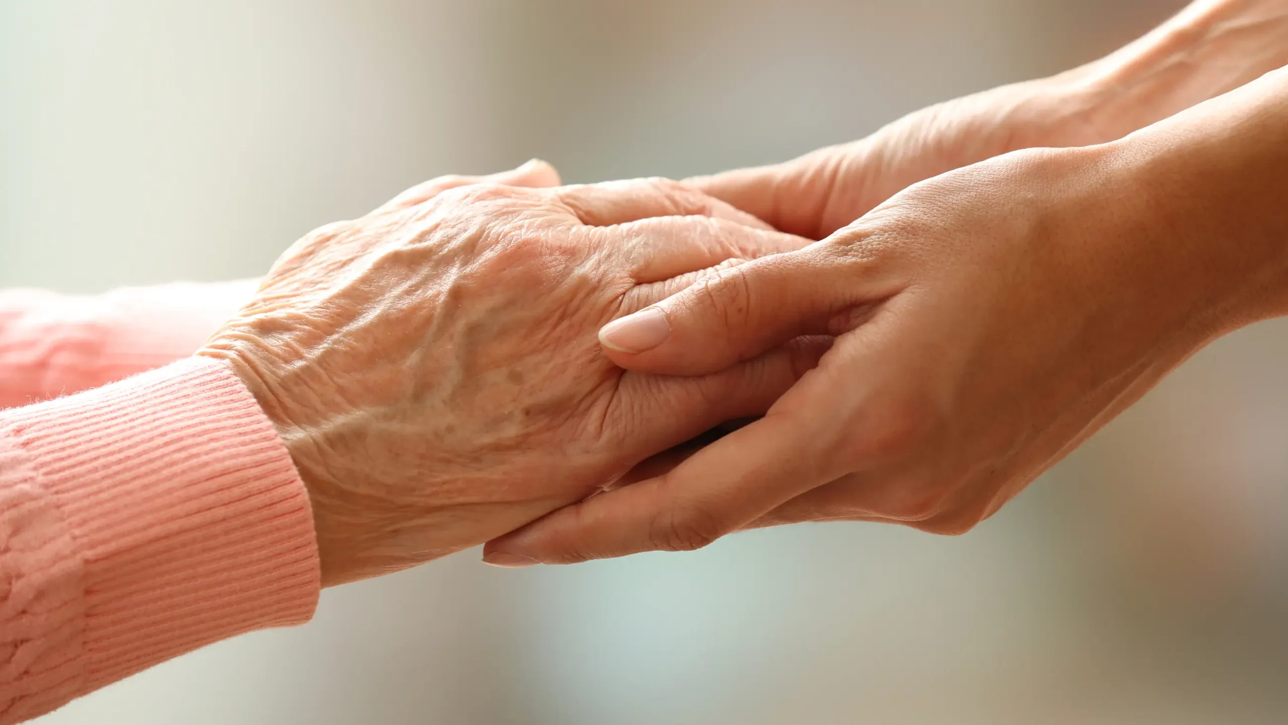 two people holding hands