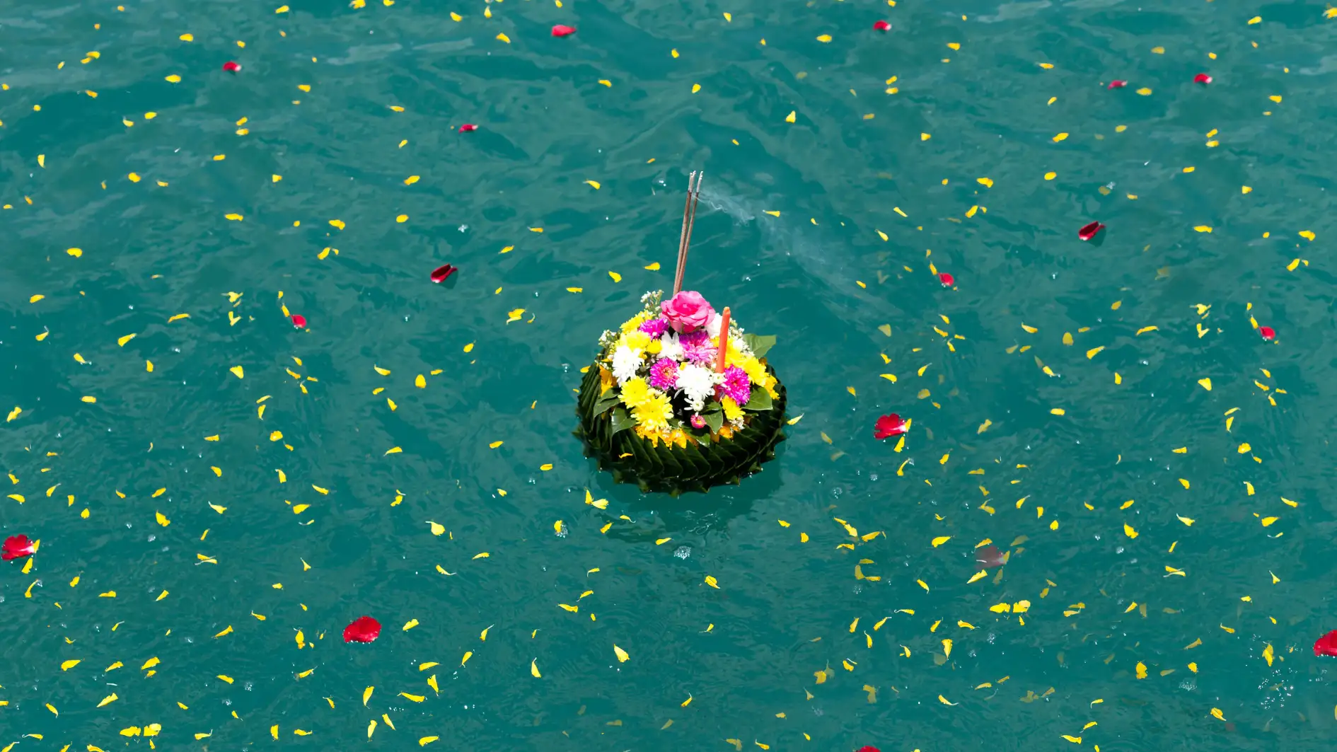 Floating flowers on the ocean in remembrance